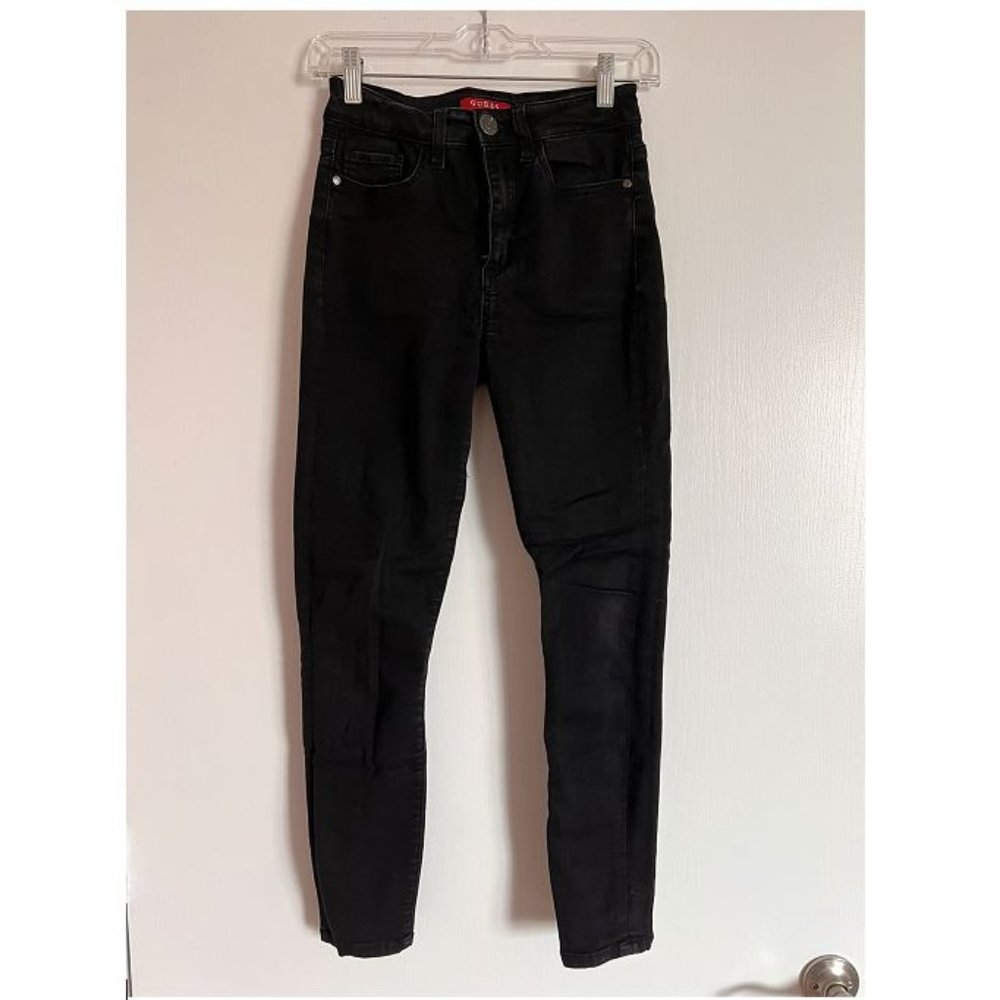 Guess black high rise jeans. Skinny leg. Size 26.